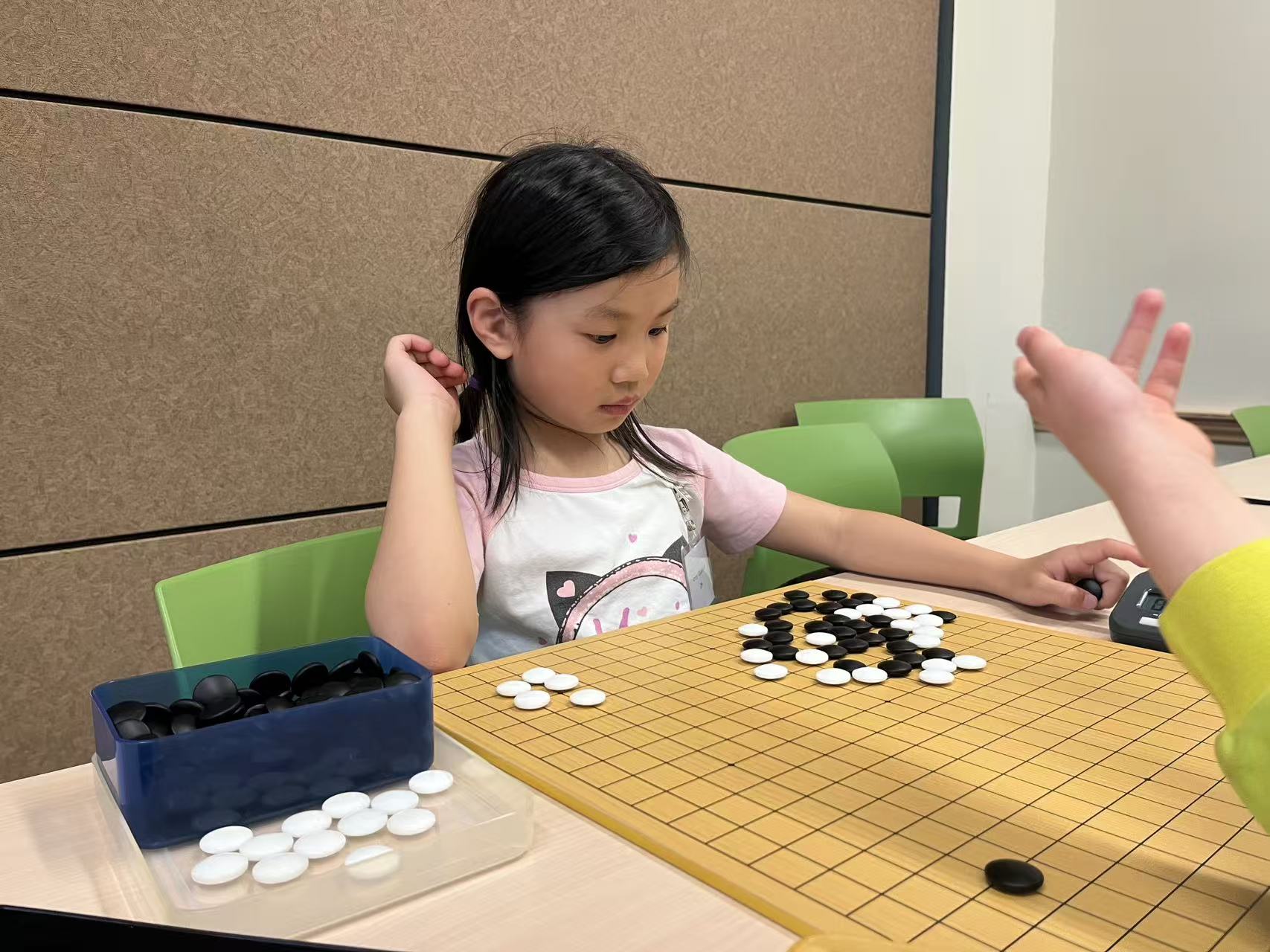 Go student concentrating during a game